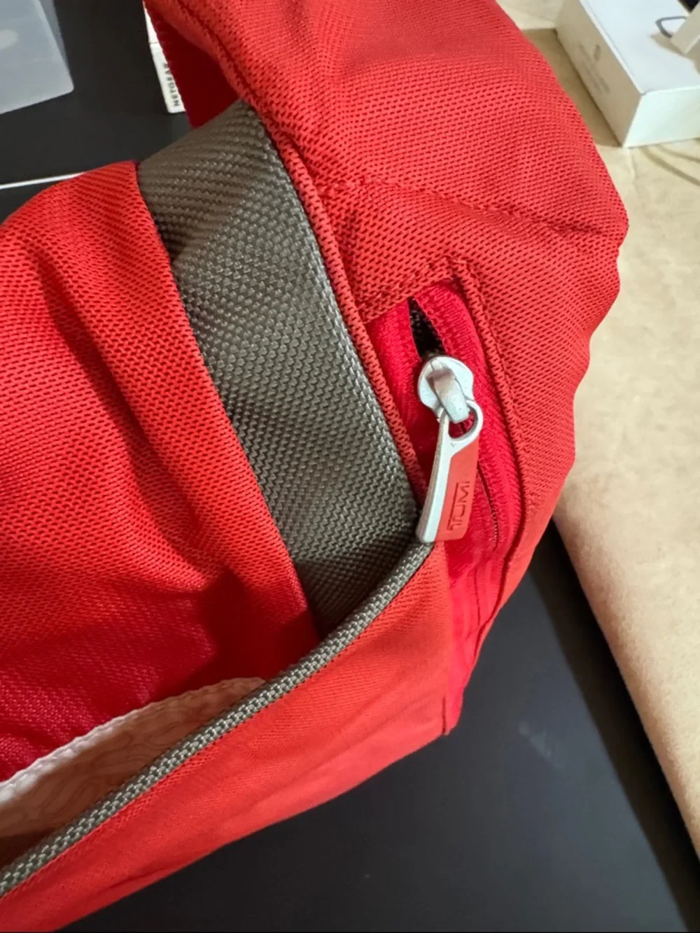 Tumi Red Messenger Bag with Gray Accent. Expandable. Laptop section.